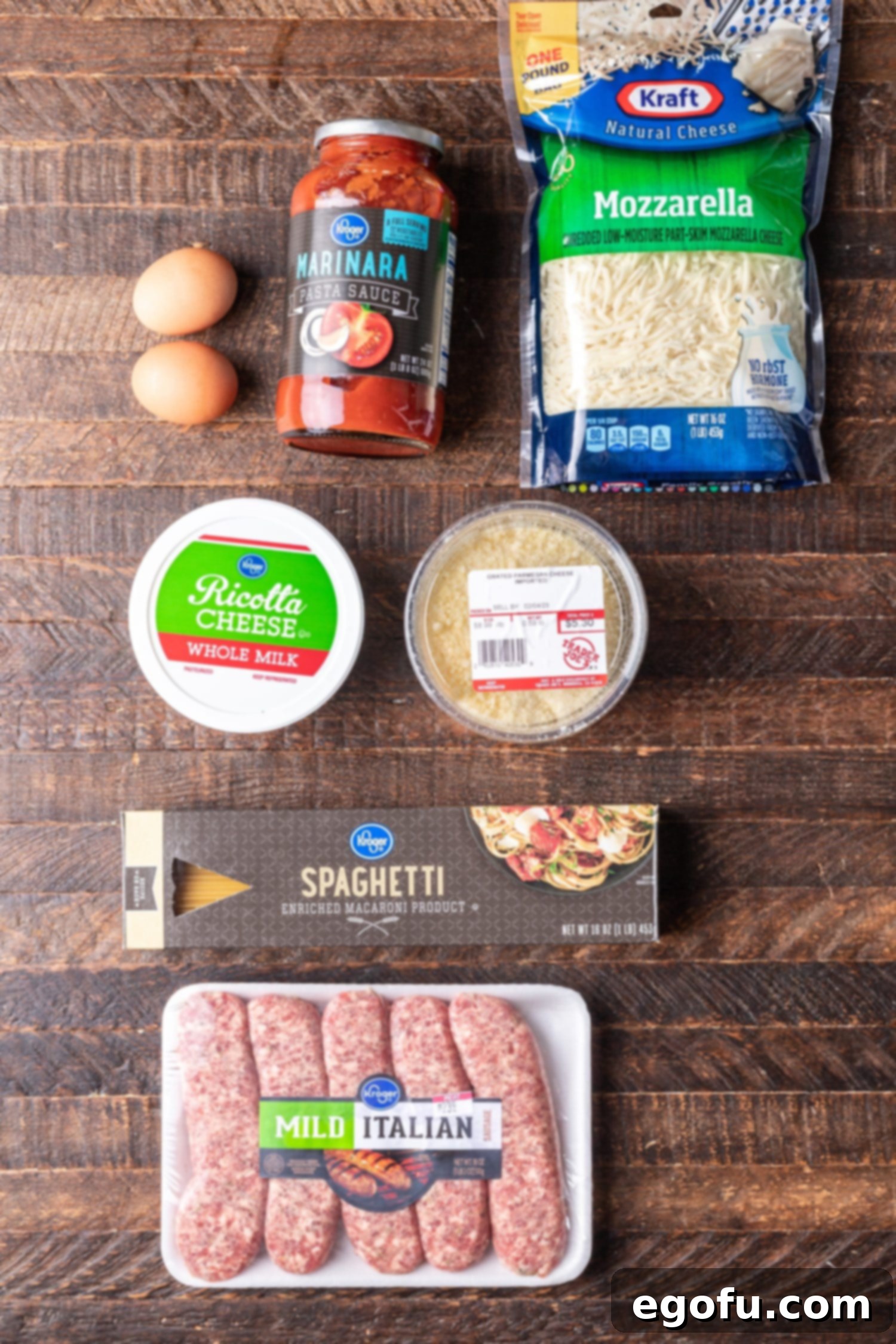 Spaghetti noodles, Italian sausage links, parmesan cheese, marinara sauce, ricotta cheese, and eggs.