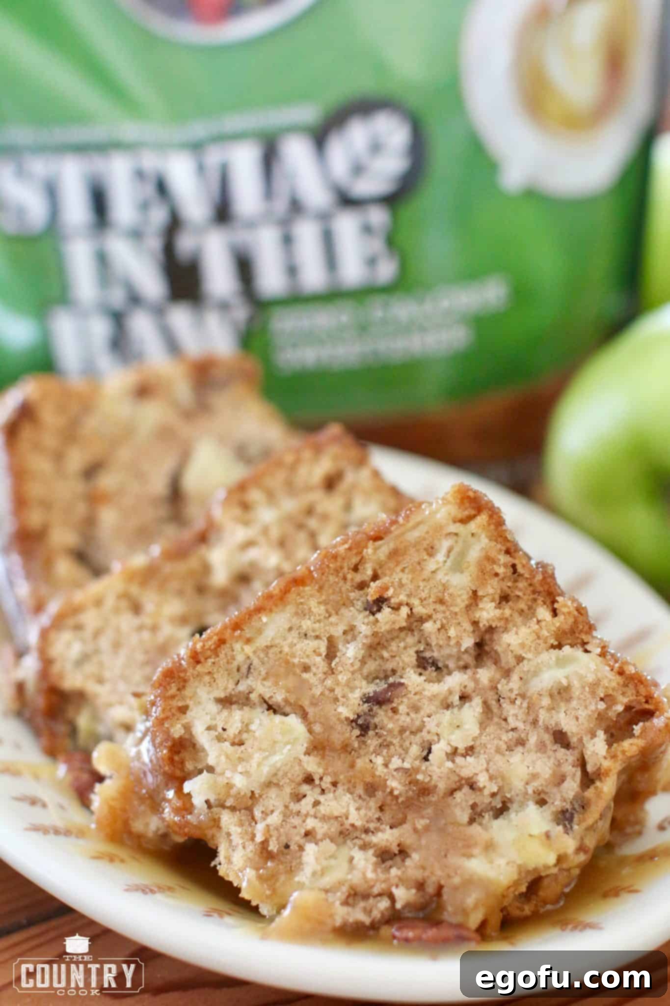 sliced fresh apple cake with stevia in the raw in the background.