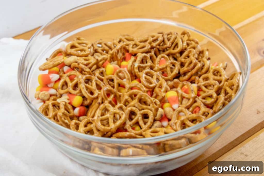 Trailer Park Terror Night 5 pretzels, peanuts, candy corn mixed together in a large bowl