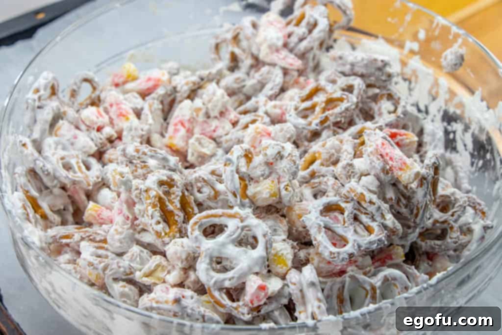 Trailer Park Terror Night 7 white chocolate covered snack mix mixed together in a large bowl