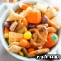 Sweet Harvest Chex Mix in a festive bowl.