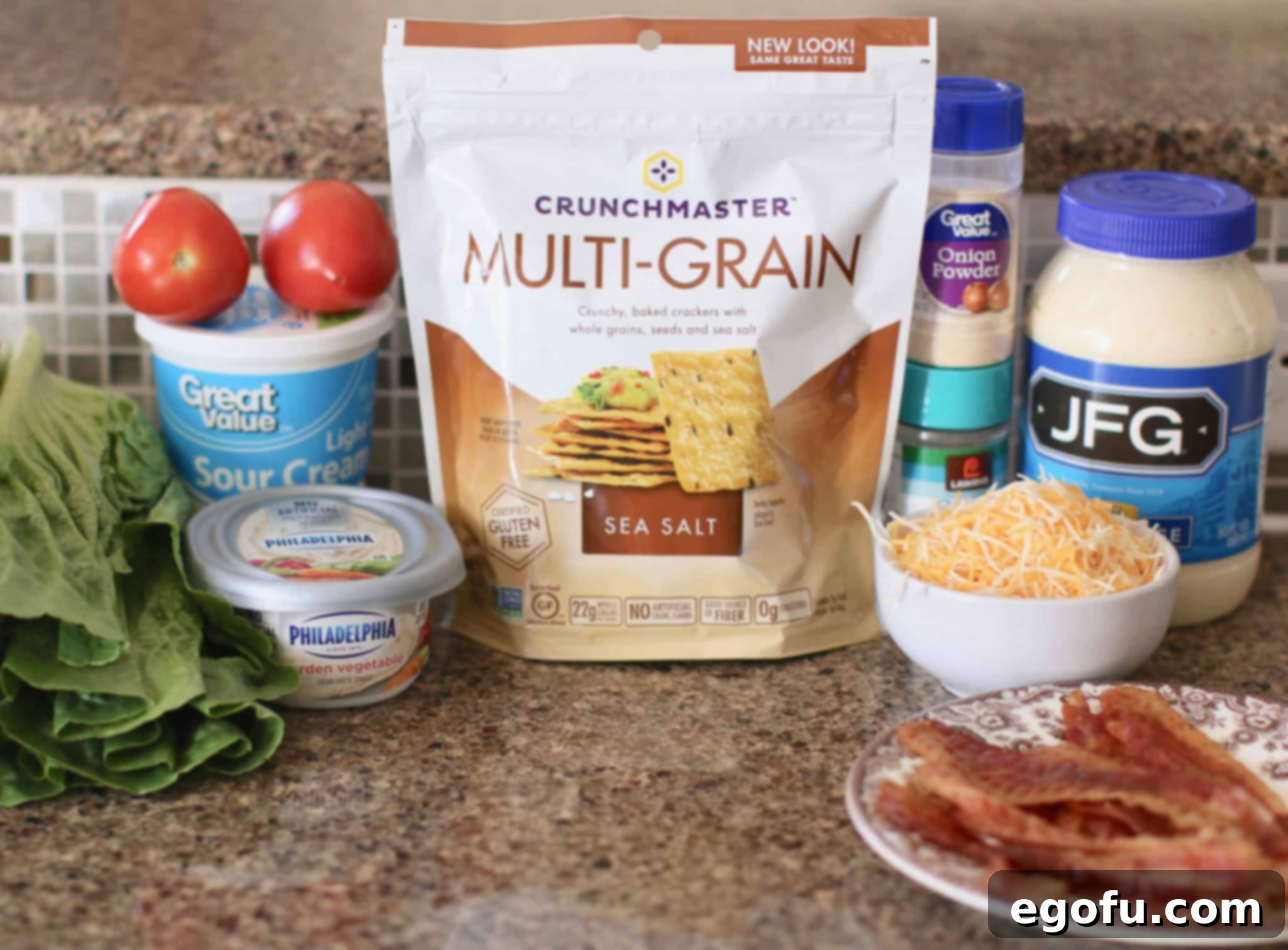 vegetable cream cheese, bacon, sour cream, mayonnaise, tomato, lettuce, cheese.