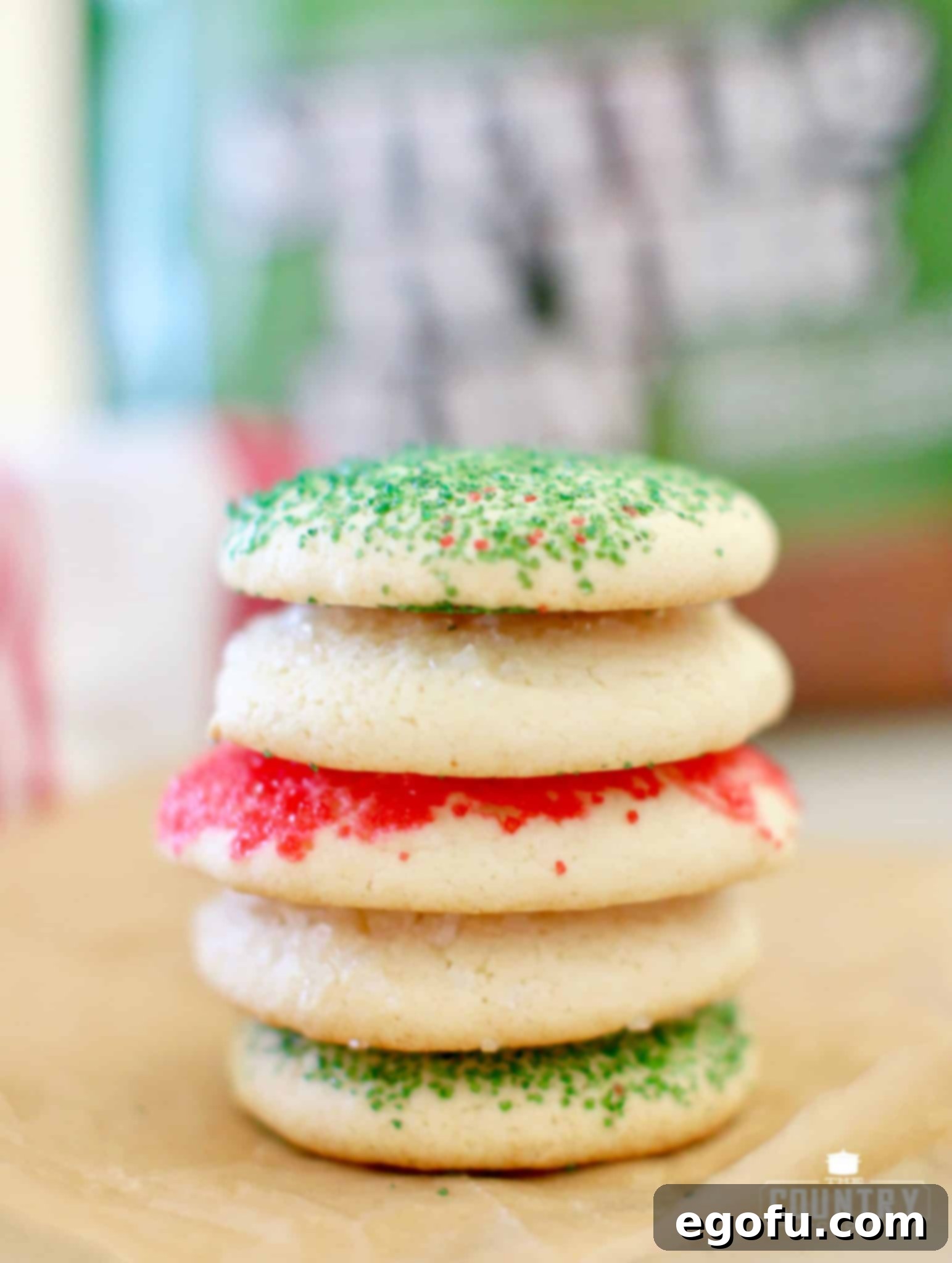Stack of soft sugar cookies, golden and perfectly baked.