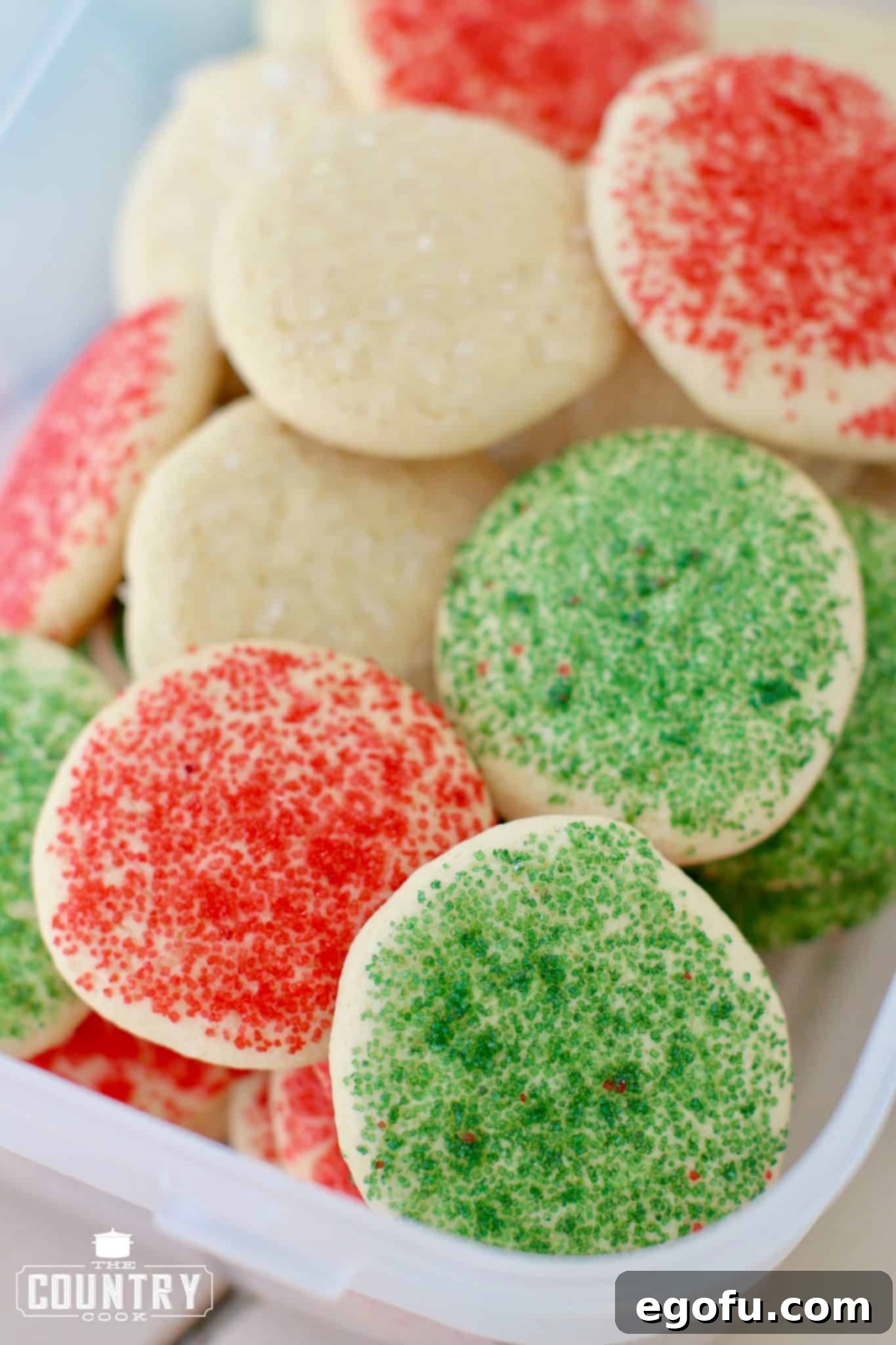 Soft sugar cookies stored in an airtight container, ready for enjoyment.