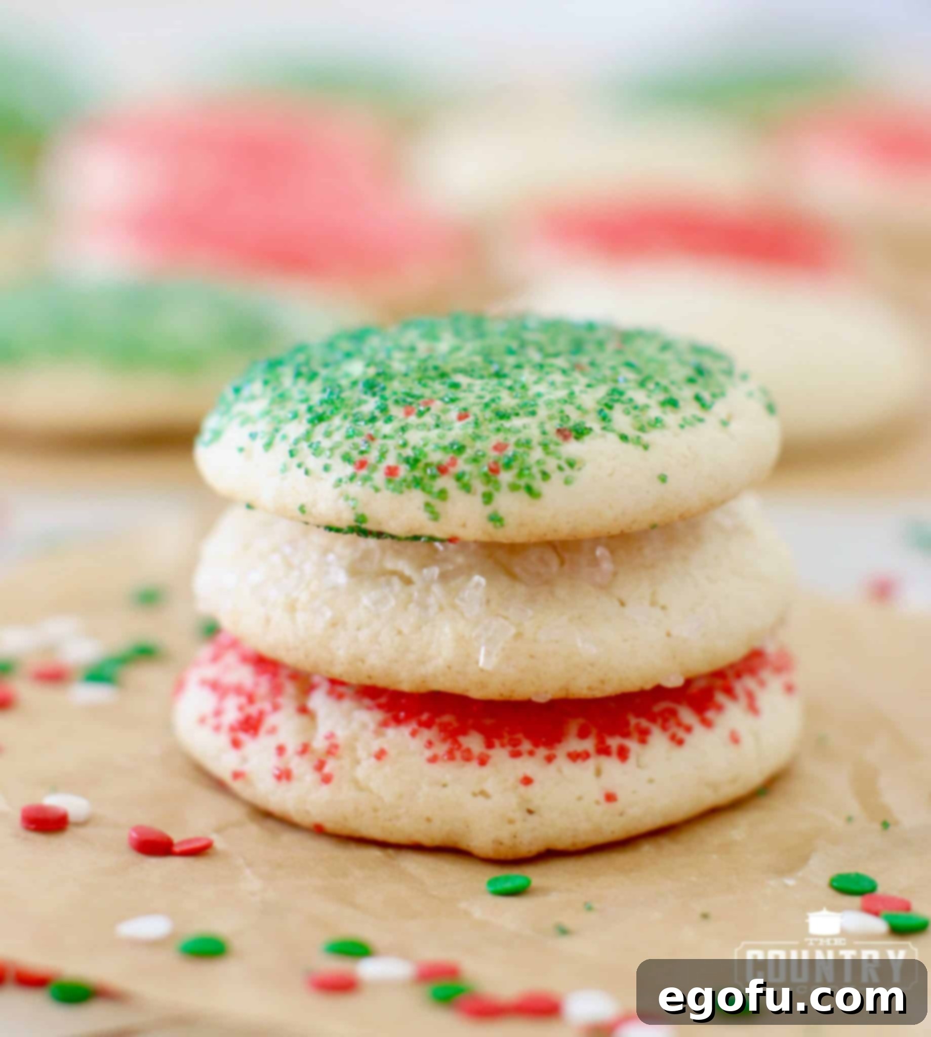 Stacked soft sugar cookies, demonstrating their easy transportability and perfect texture.