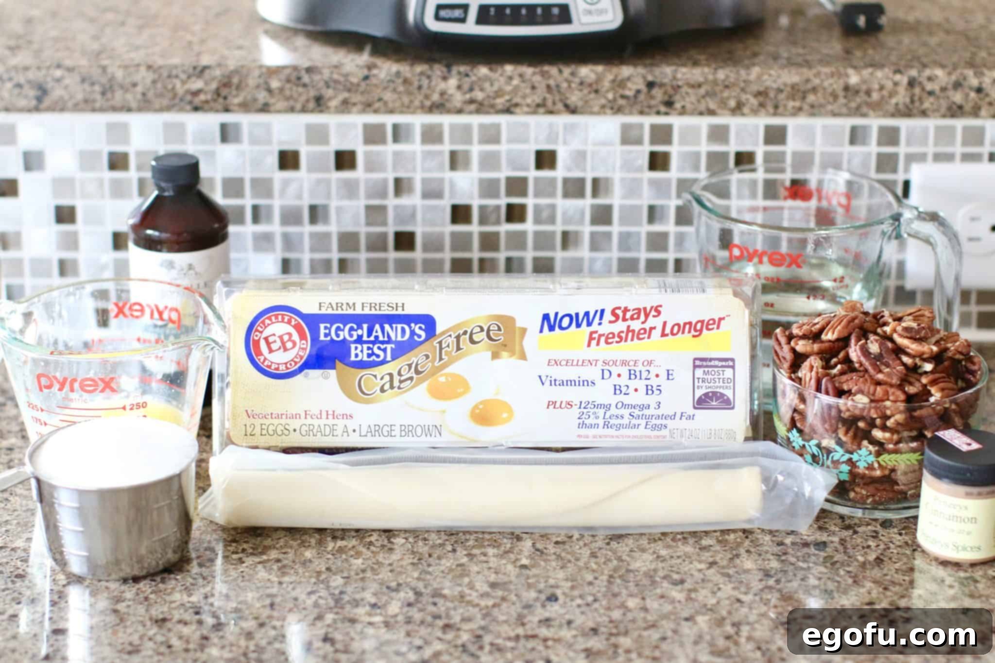 A flat lay of all the essential ingredients for slow cooker pecan pie: eggs, whole pecan halves, vanilla extract, granulated sugar, a rolled-out pie crust, and ground cinnamon, ready for preparation.