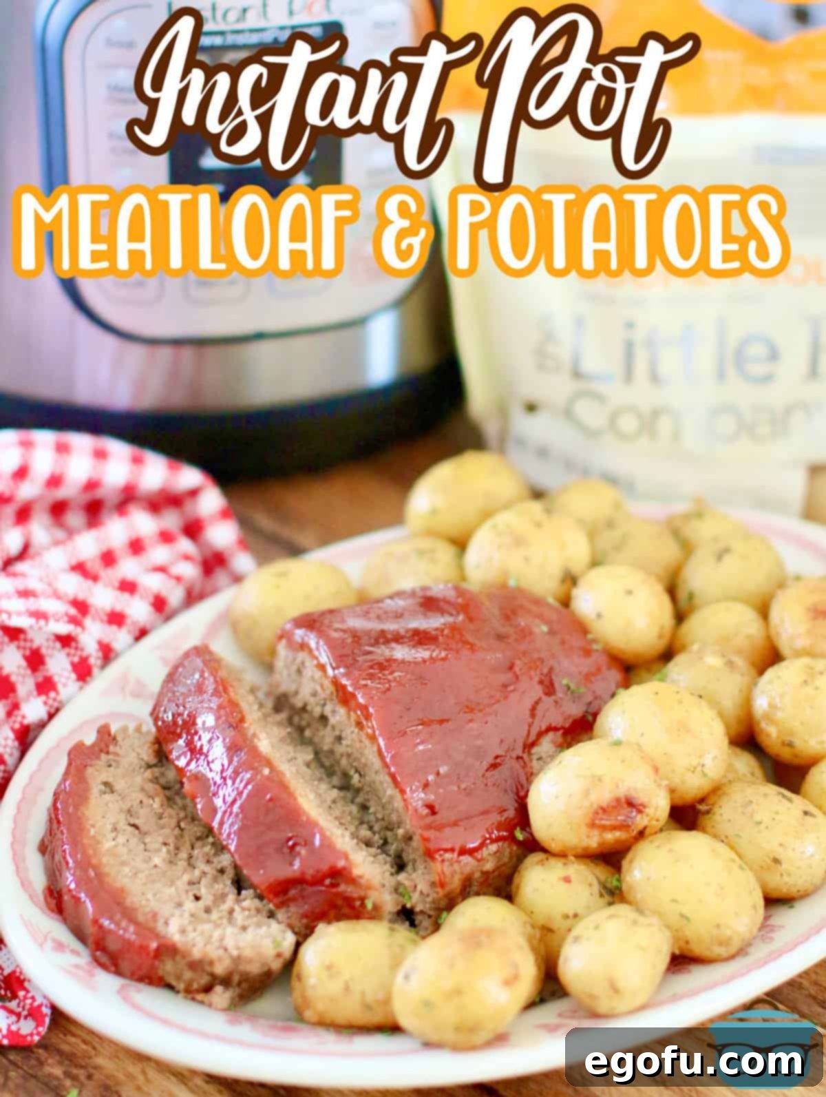 Sliced meatloaf on a plate with cooked golden baby potatoes, with an Instant Pot visible in the background, highlighting the one-pot cooking method.