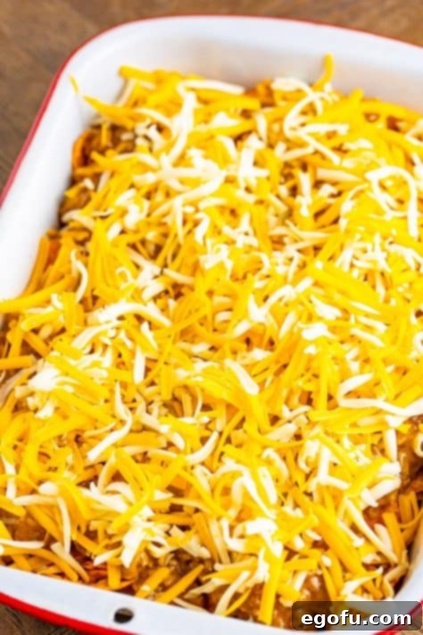 Layered unbaked taco casserole.