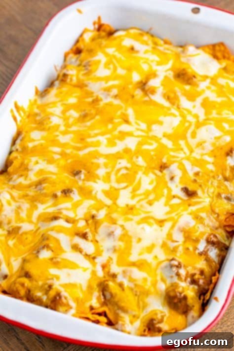 Melted cheese on top of a Doritos Casserole.