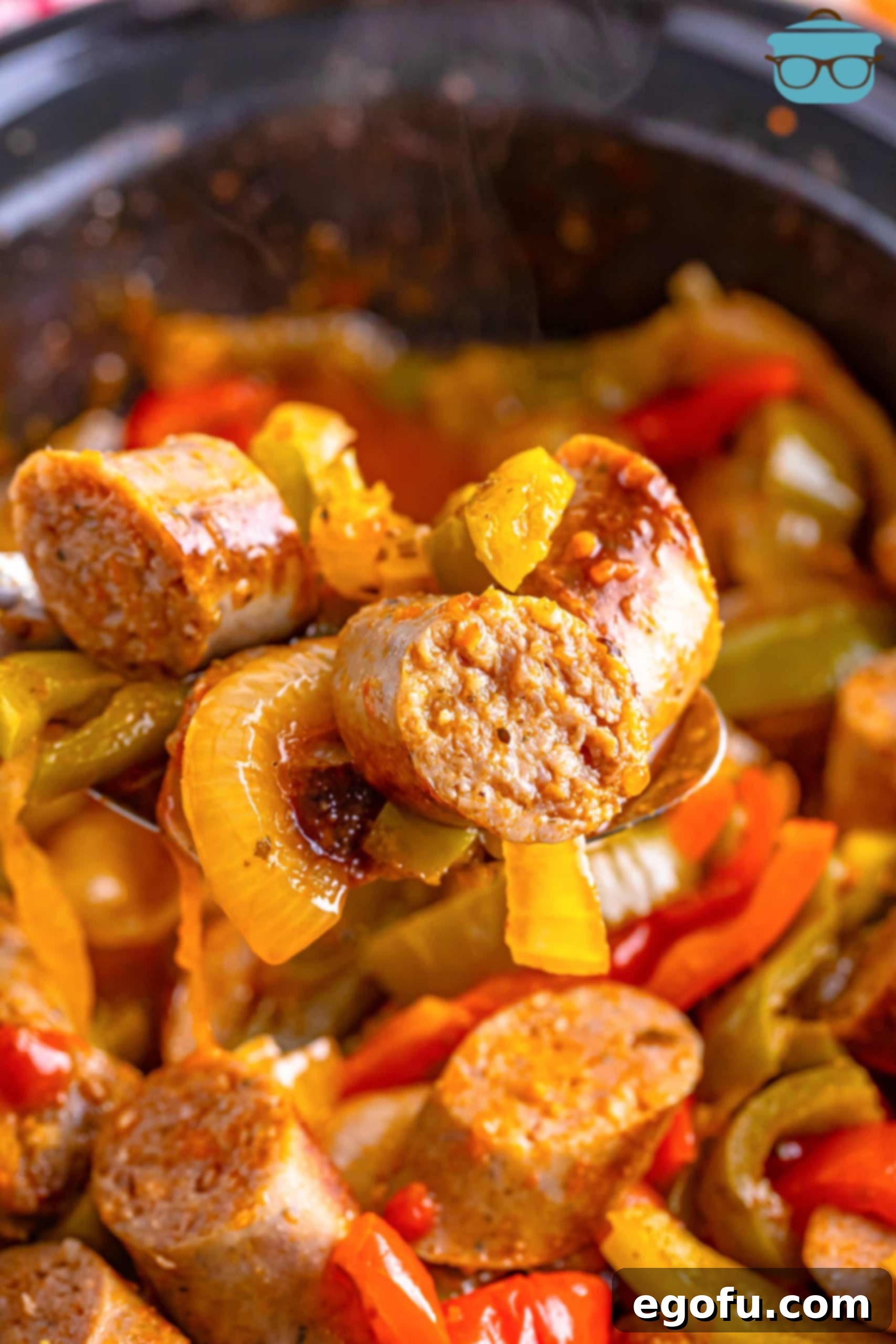 Close up looking at some Sausage and Peppers in the Crock Pot. 