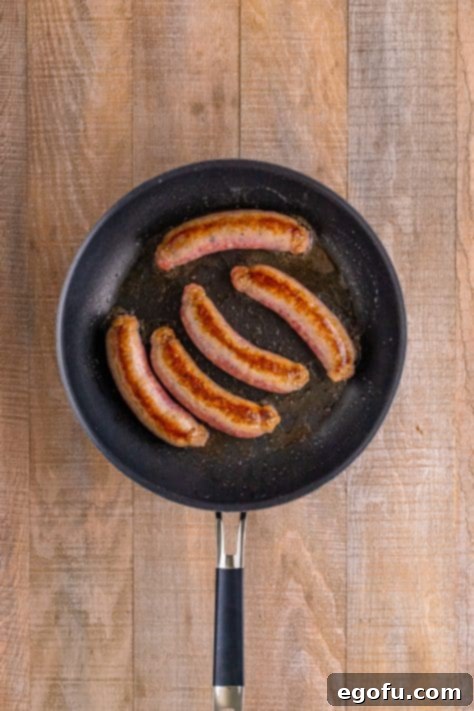 Cooked sausage in a pan.