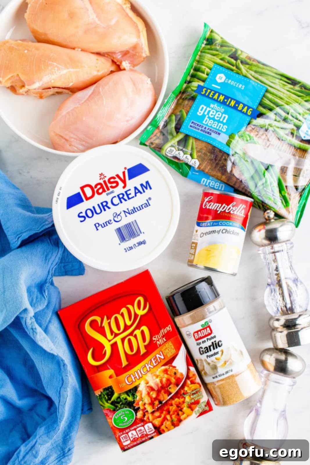 chicken breasts, green beans, sour cream, cream of chicken, Stove Top stuffing, salt, pepper and garlic powder. 