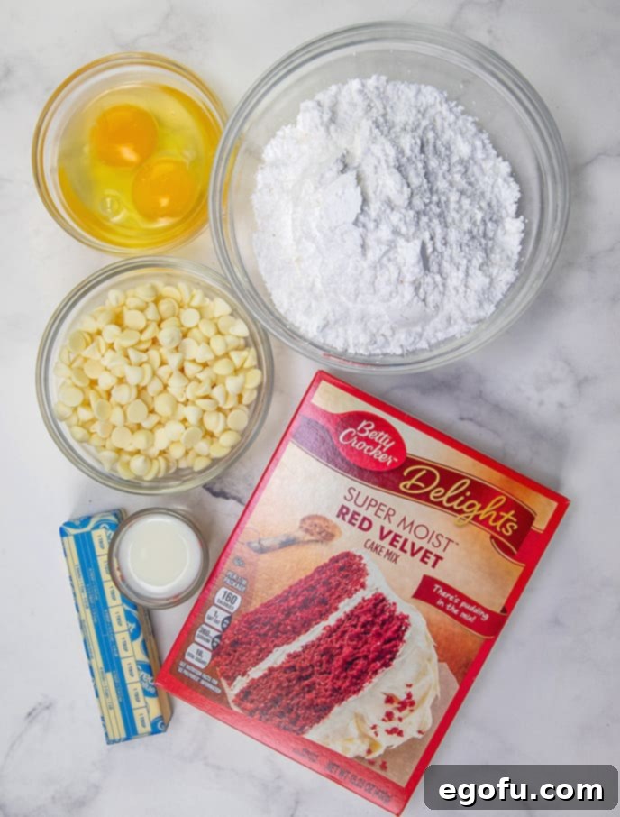 Velvet Red Dream Bars 4 red velvet cake mix, unsalted butter, large eggs, white chocolate chips, powdered sugar, milk.
