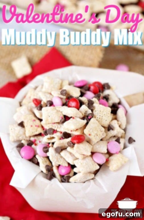 Overhead photo of Valentine's Day Muddy Buddies in a parchment paper lined bowl.