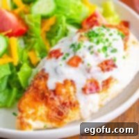 Low Carb Parmesan Chicken with Creamy Bacon Sauce.