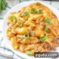 Crock Pot Taco Pasta topped with sliced green onions