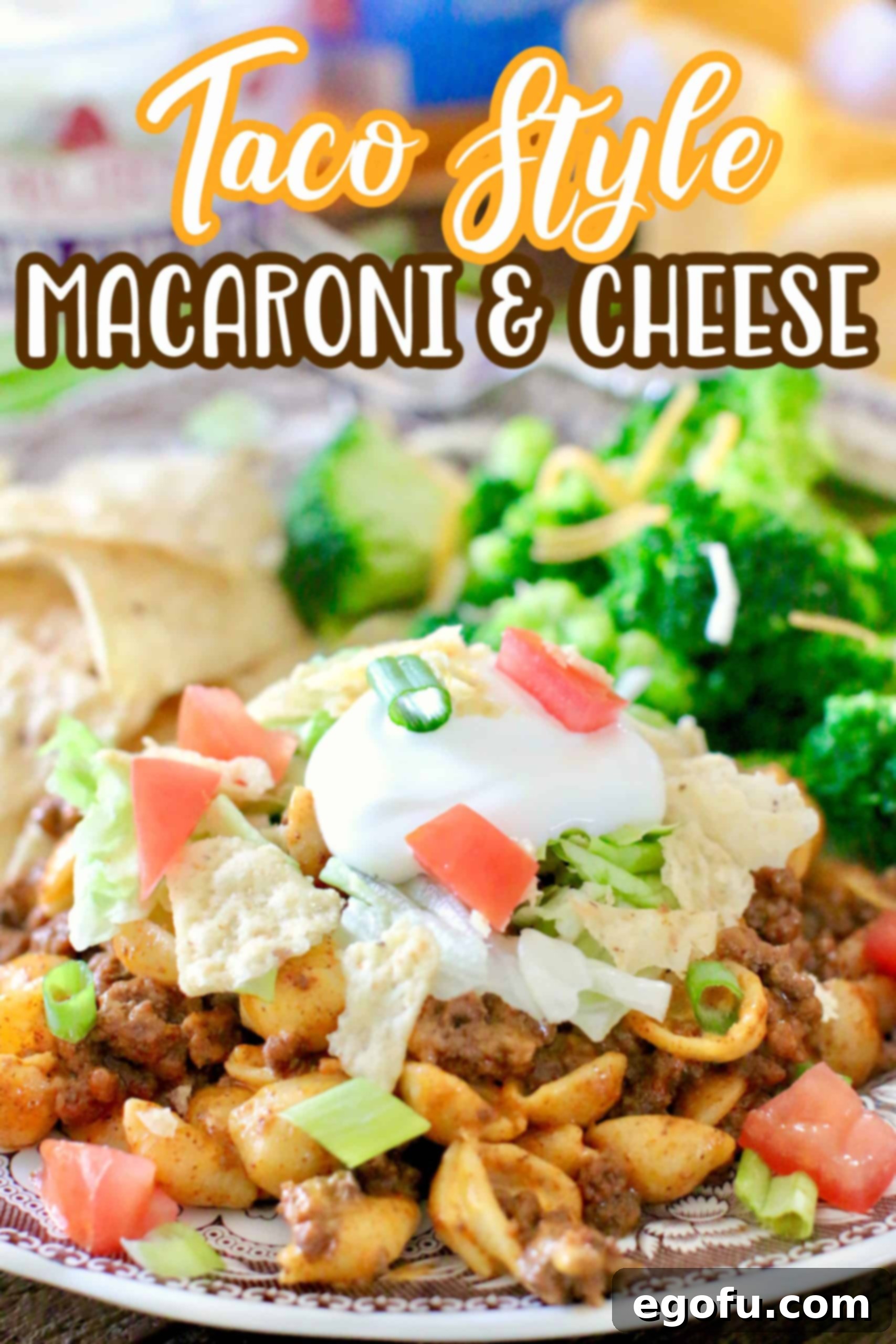 Fiesta Mac and Cheese 3 Easy Taco Macaroni and Cheese recipe shown served on a plate with steamed broccoli and tortilla chips.