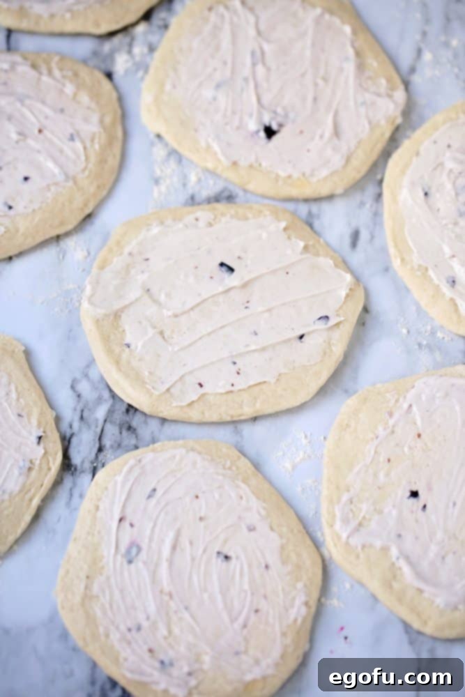 Heavenly Blueberry Tear & Share 6 blueberry cream cheese spread on flattened refrigerated biscuits.