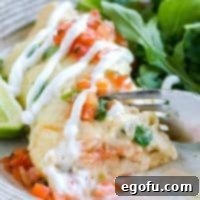 Shrimp Enchiladas with cream sauce and pico de gallo