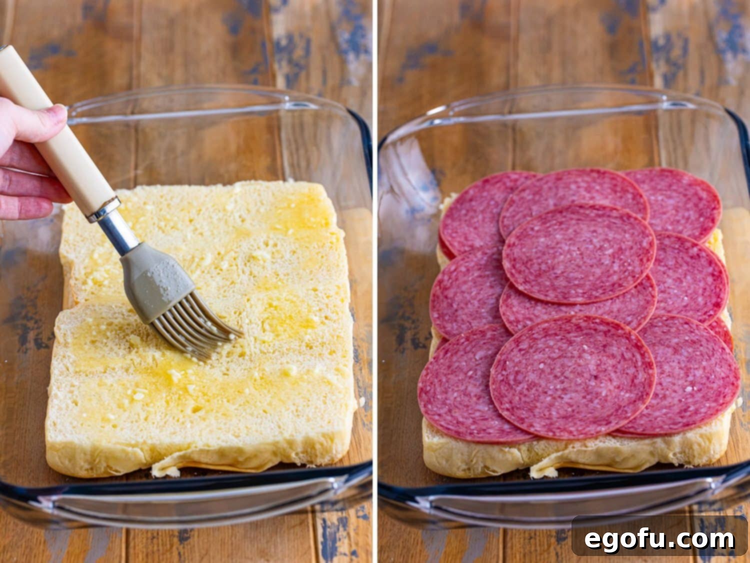 A basting brush applying garlic butter to the bottom buns, and then salami being layered onto the bread.
