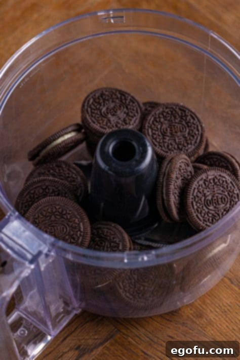 Oreo cookies added into food processor.