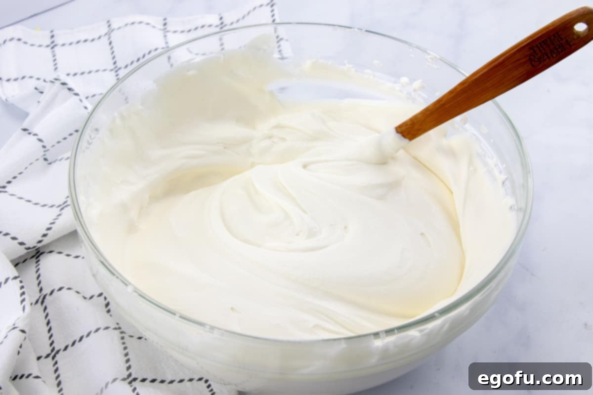 whipped cream and sweetened condensed milk stirred together in a large bowl
