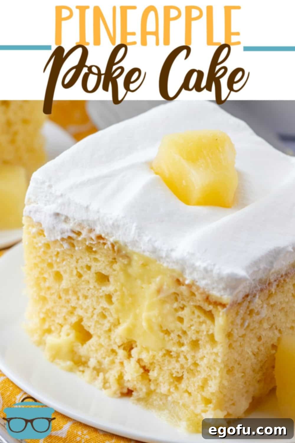 A vibrant, delicious Pineapple Pudding Poke Cake ready to be served, showcasing its generous layer of whipped topping and fresh pineapple chunks.