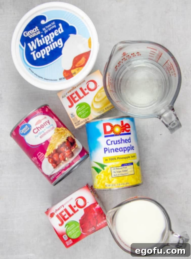 cherry pie filling, cherry gelatin, crushed pineapple, milk, instant vanilla pudding, water, whipped topping