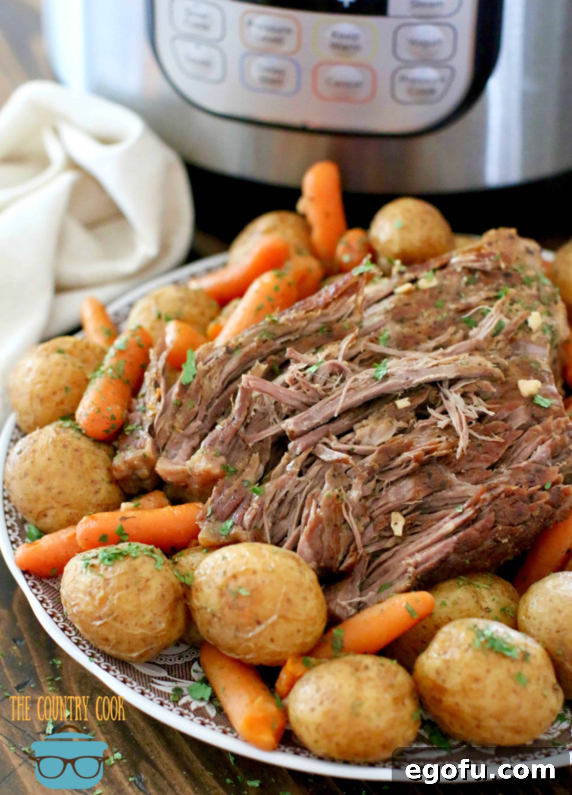 Electric Pressure Cooker Beef Pot Roast, baby potatoes and baby carrots.