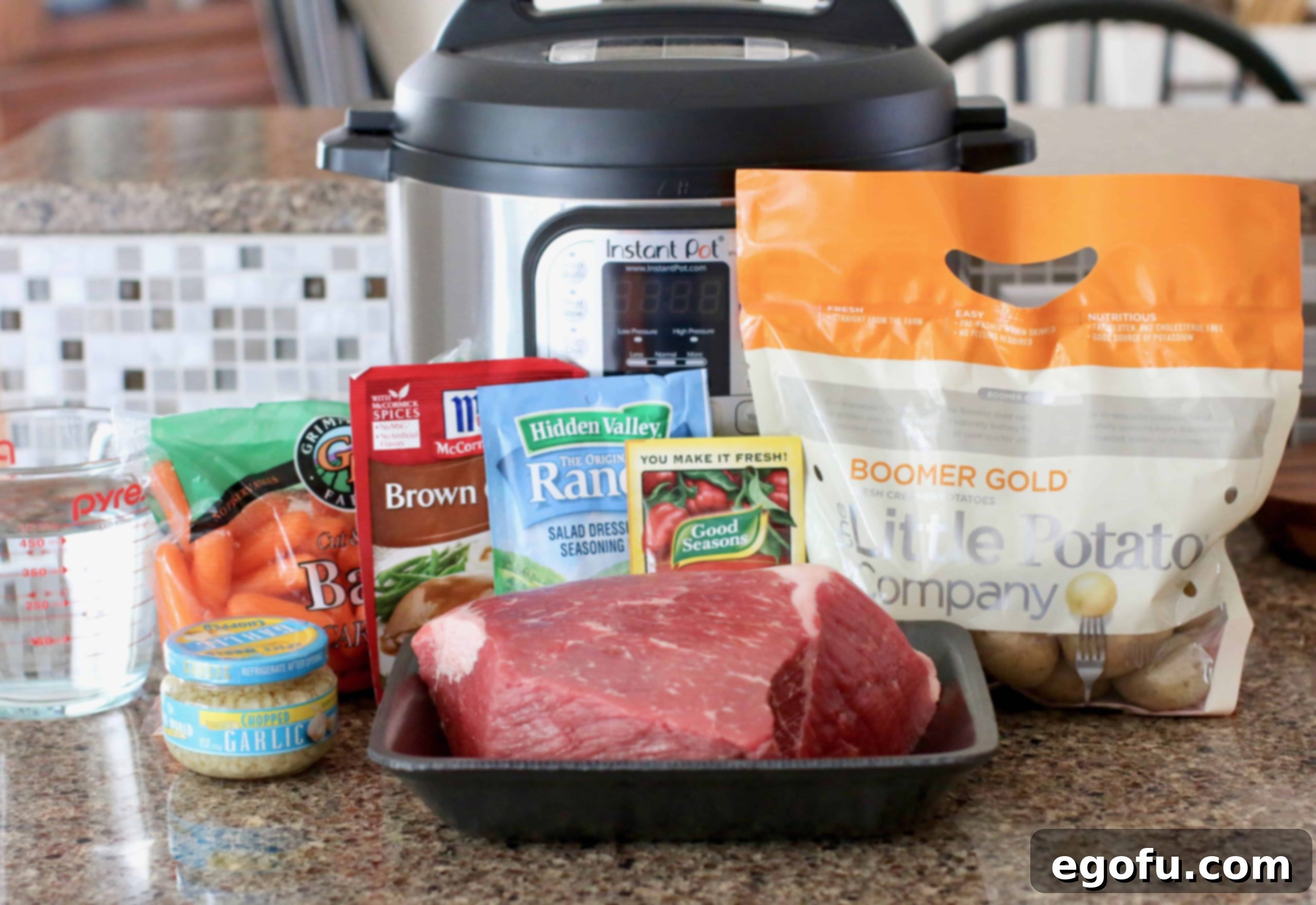 Instant Pot, beef roast, Little Potatoes, carrots, garlic, water, brown gravy mix, ranch dressing mix, Italian dressing mix.