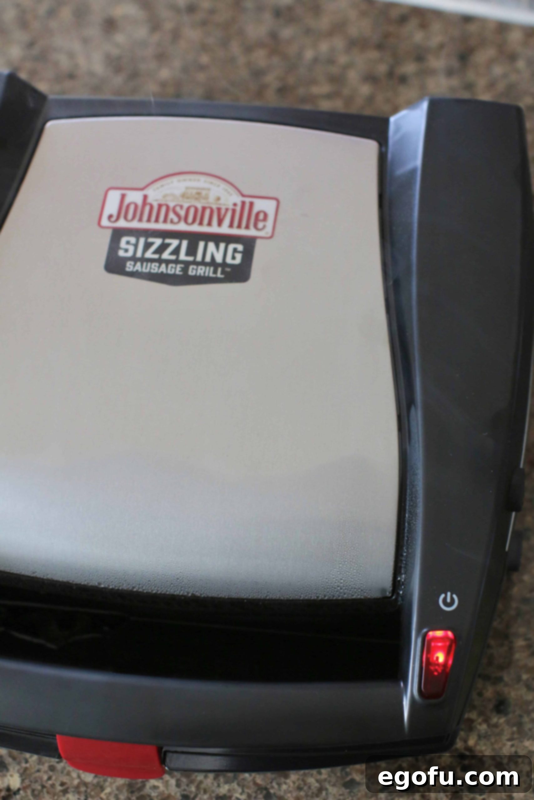 Johnsonville Sausage Grill with light on.