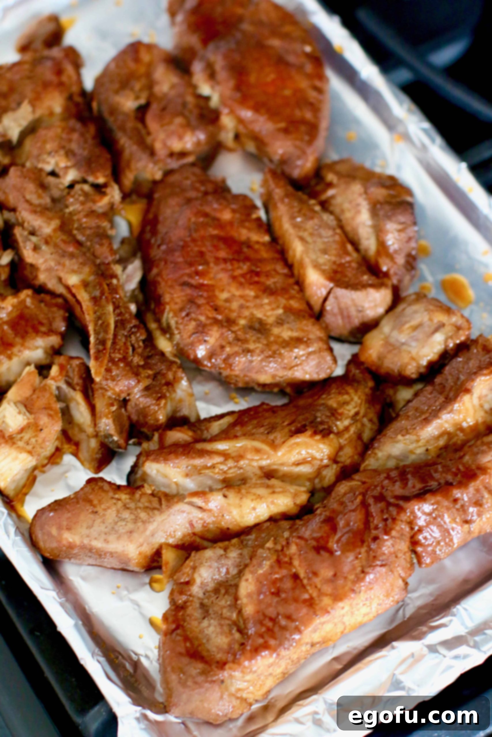 Instant Pot Tender Korean BBQ Country Ribs 17 Korean country style ribs on baking sheet.