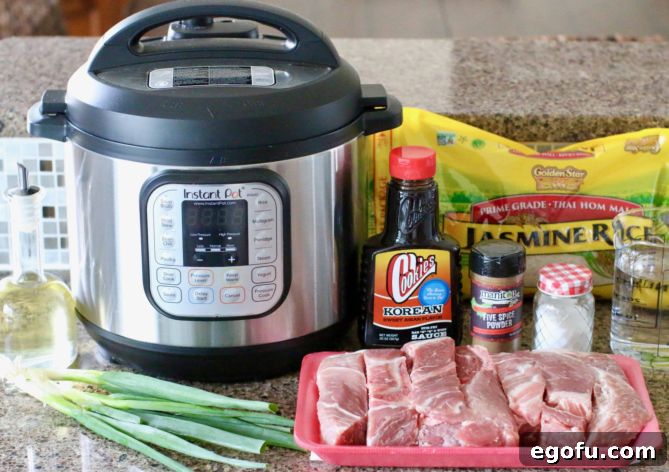 Instant Pot Tender Korean BBQ Country Ribs 4 Instant Pot, country style ribs, Korean BBQ sauce, green onion, Chinese five spice, salt, rice, water.