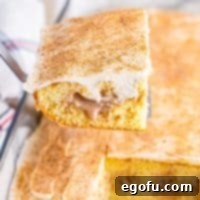 Cinnamon Swirl Poke Cake 10 Cinnamon Roll Poke Cake recipe from The Country Cook