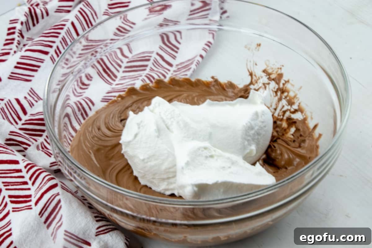 chocolate frosting and whipped topping mixed together