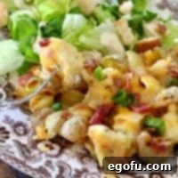 Air Fryer Hearty Chicken and Potato Medley 2 AIR FRIED CHICKEN AND POTATOES TOPPED WITH CHEESE AND BACON