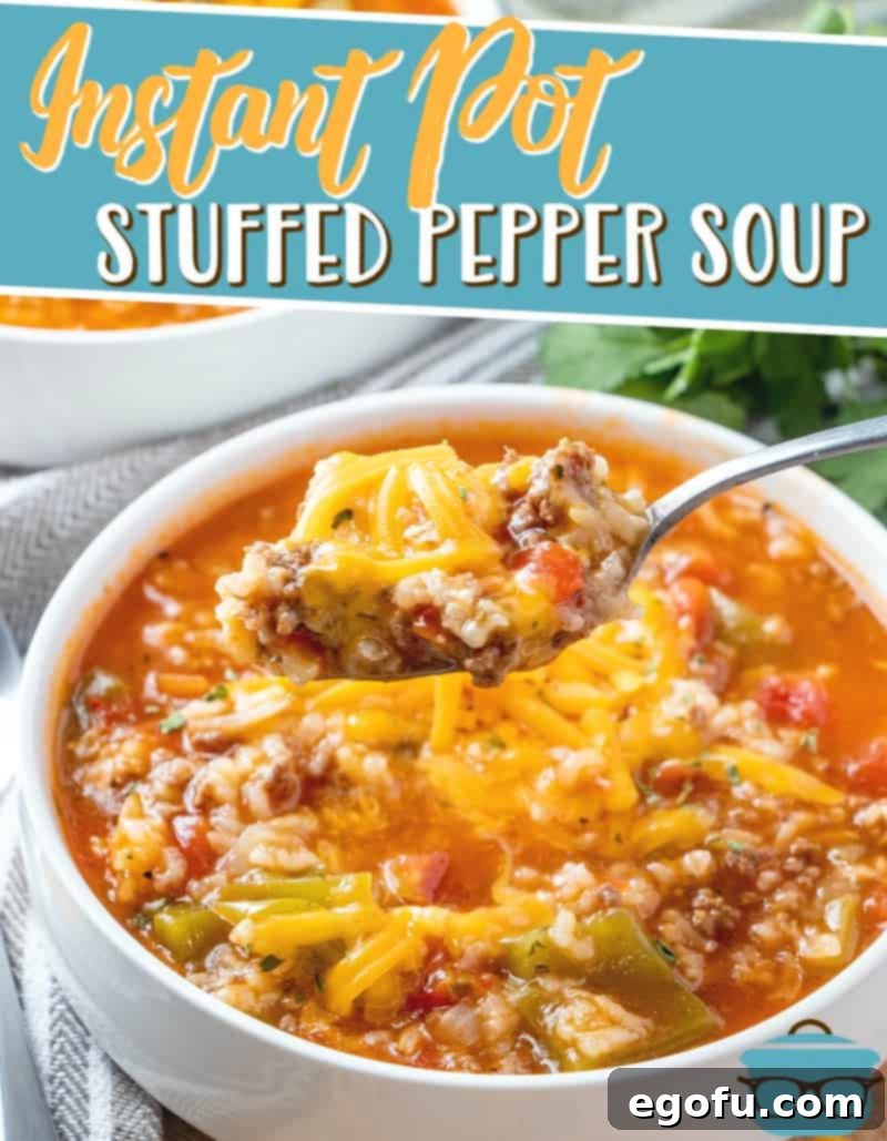Deconstructed Stuffed Pepper Soup 3 A vibrant and hearty Instant Pot Stuffed Pepper Soup, steaming in a large pot, garnished with fresh herbs and a swirl of cream, ready to be served as a quick dinner.