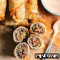 Crispy Cheeseburger Rolls 12 CHEESEBURGER EGGS ROLLS WITH DIPPING SAUCE
