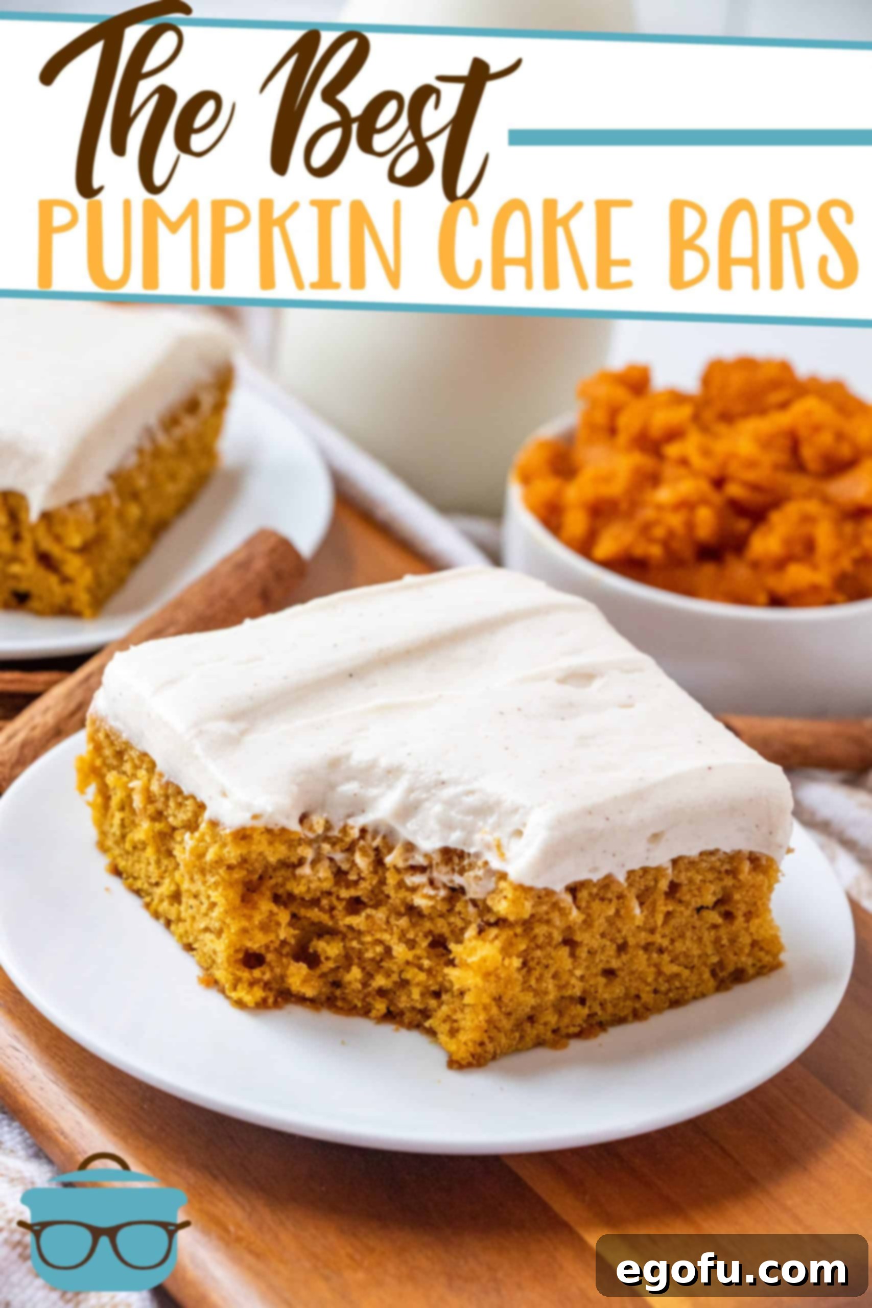 The Best Pumpkin Cake Bars recipe from The Country Cook, a slice shown on a small white round plate with a bite taken out.