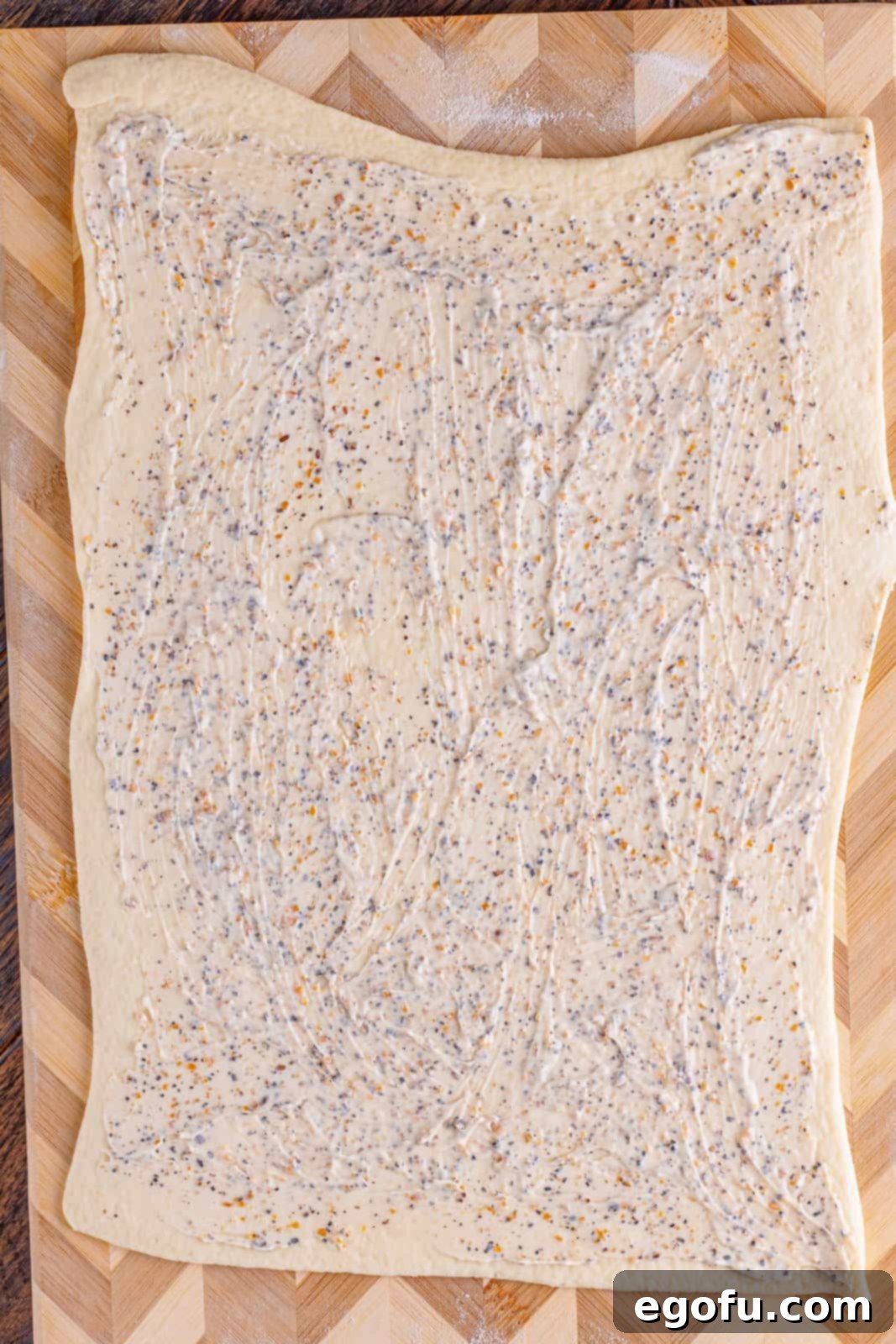 Philly Cheesesteak Pinwheels 8 mayonnaise steak seasoning mixture spread on top of the pizza dough.