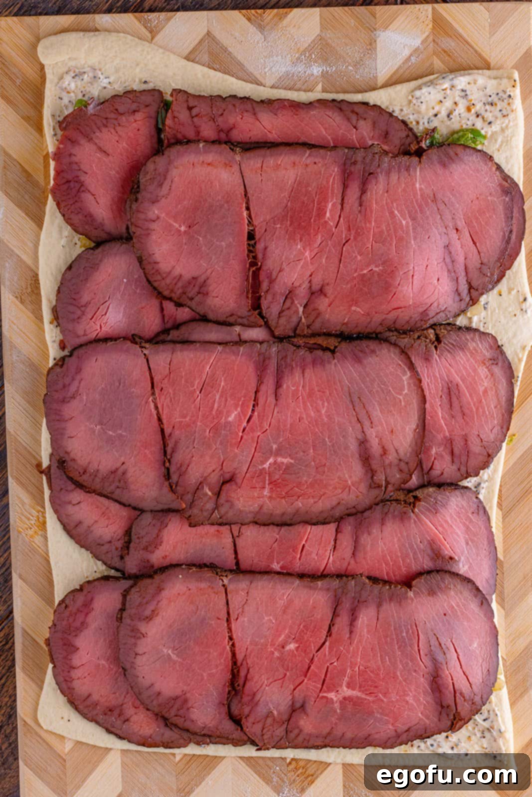 Philly Cheesesteak Pinwheels 10 layered roast beef on pizza dough.