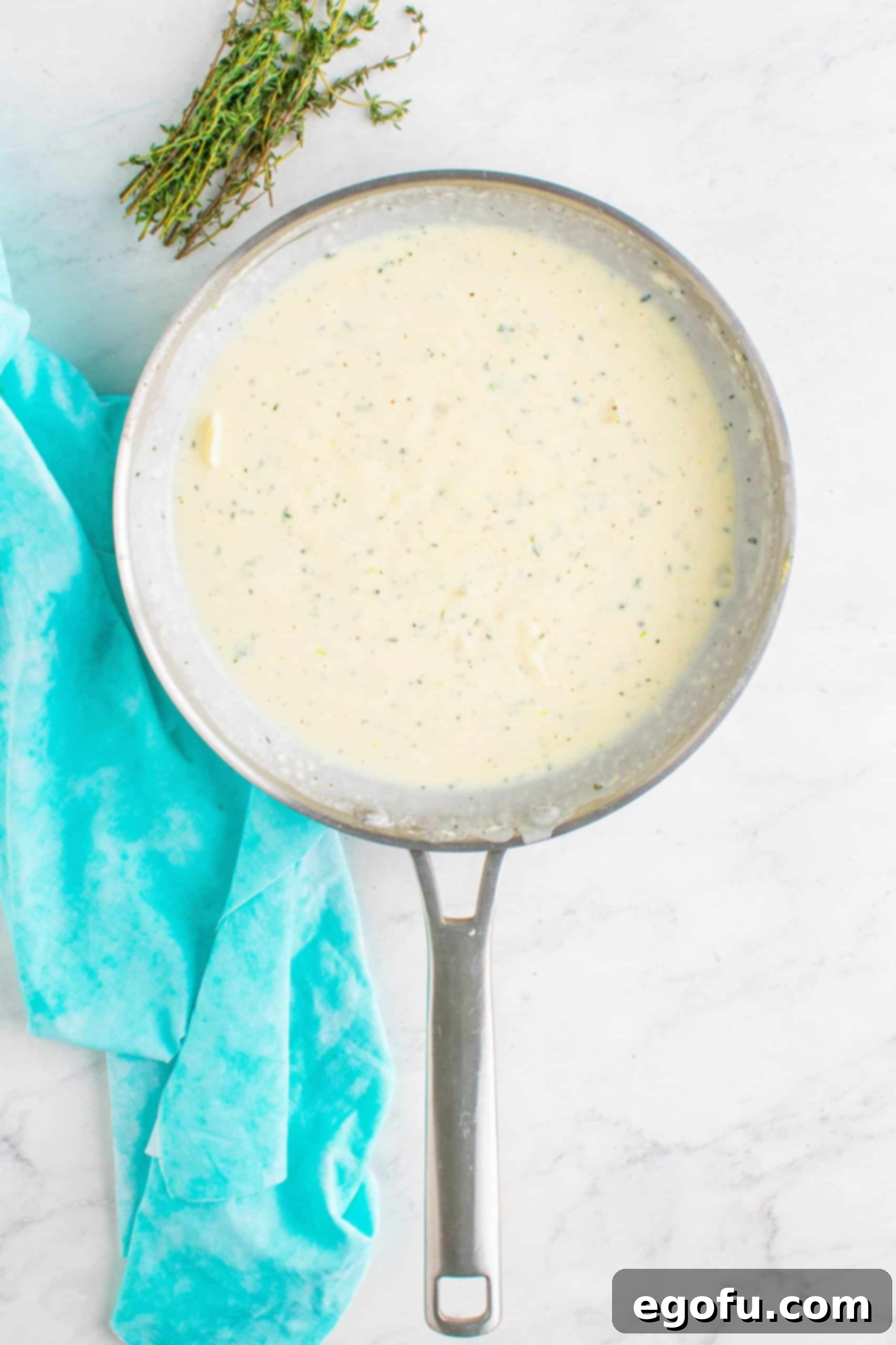 milk and heavy cream added to skillet.