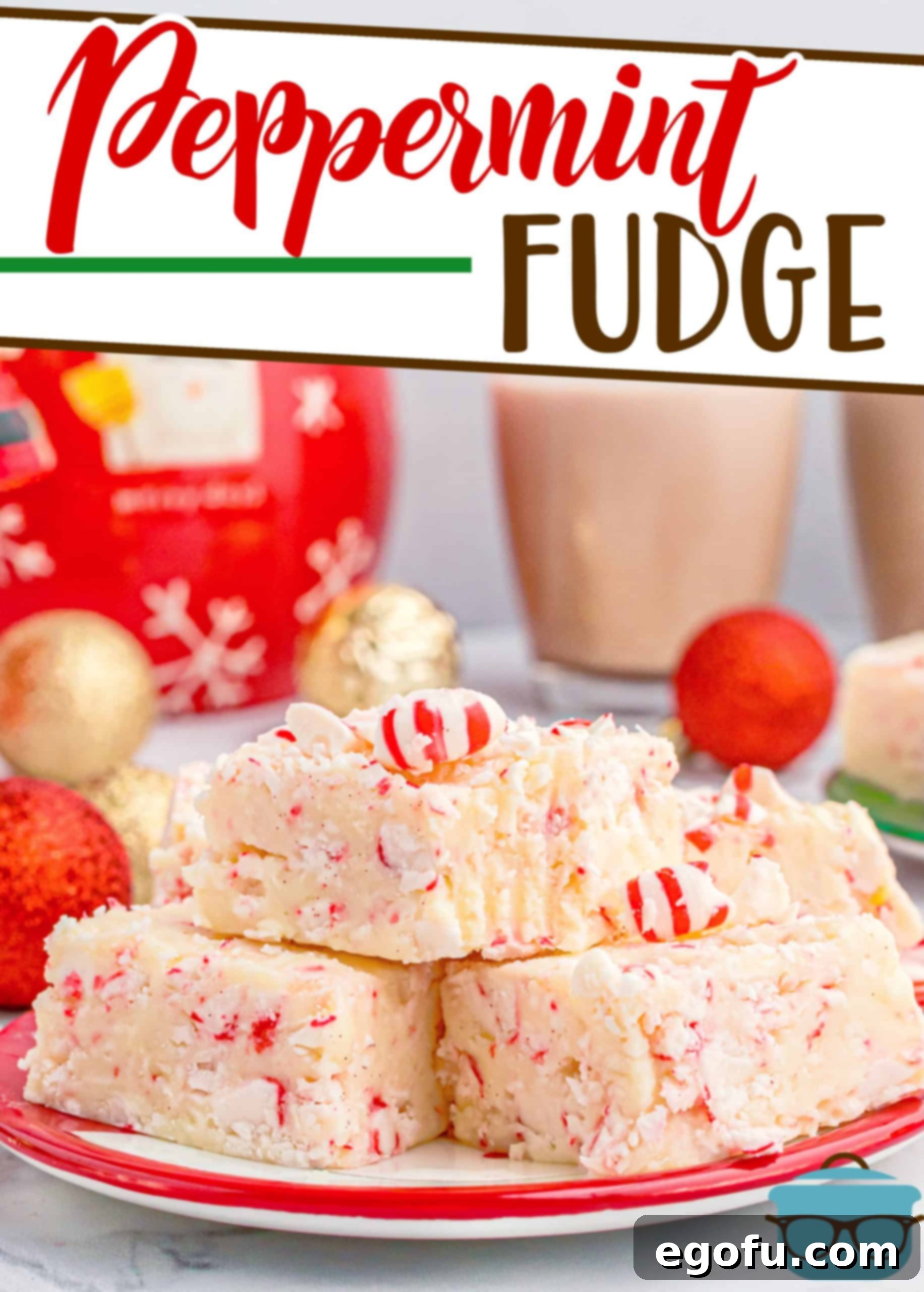 Easy Candy Cane Peppermint Fudge recipe from The Country Cook, showing perfectly cut pieces of fudge stacked on a red and white holiday plate with a warm cup of hot chocolate in the background, symbolizing cozy Christmas moments.