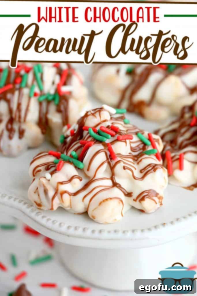 White Chocolate Peanut Clusters recipe from The Country Cook - close-up of finished peanut clusters on a white cake plate, highlighting their appetizing appeal.