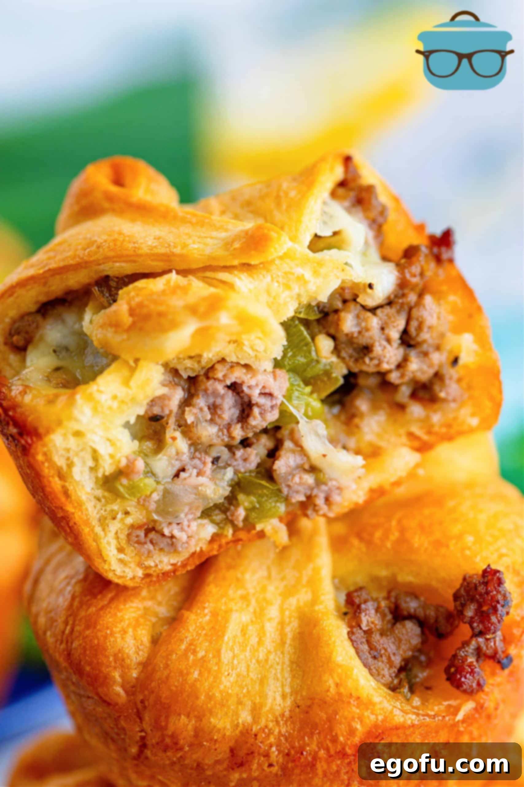 Philly Cheesesteak Poppers 2 Close up of inside of one Philly Cheesesteak Cup, showing the cheesy beef and pepper filling.