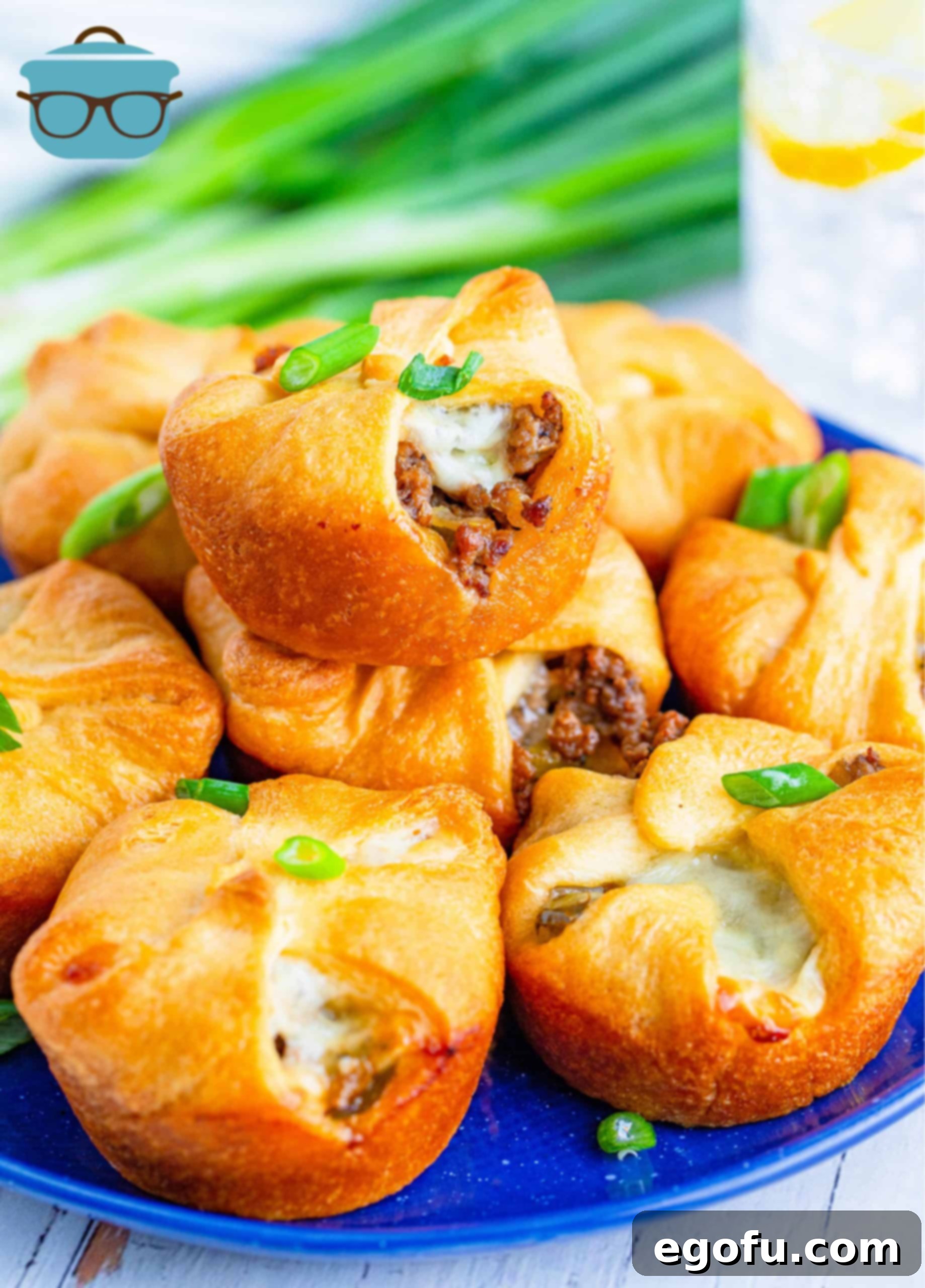 Philly Cheesesteak Poppers 13 Plate of stacked Philly Cheesesteak Cups, ready to be served.