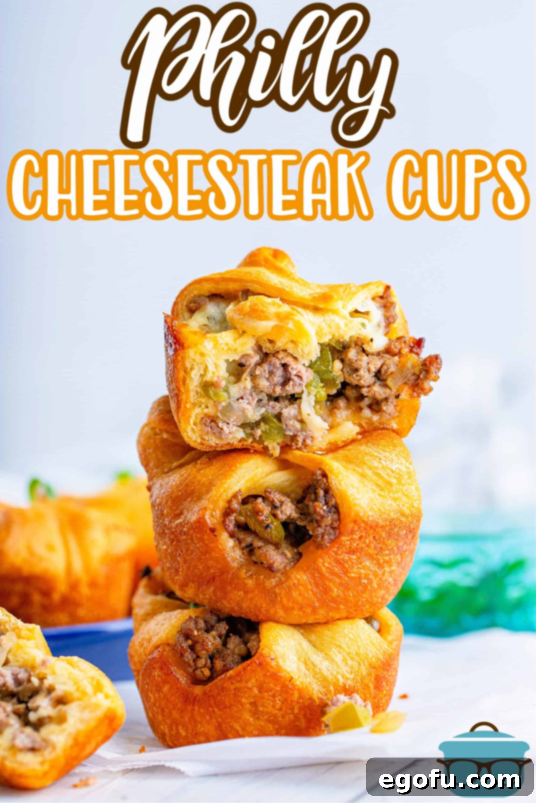 Philly Cheesesteak Poppers 3 Three stacked Philly Cheesesteak Cups on a napkin, showcasing their golden-brown crust.