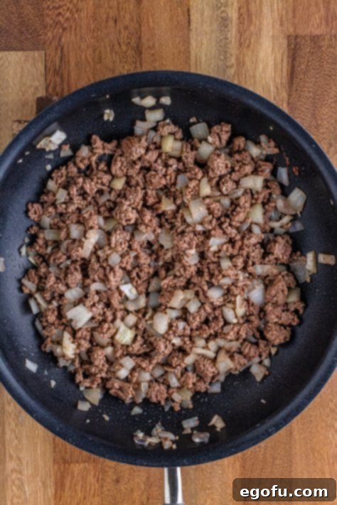 browned and crumbled ground beef with onion and garlic.