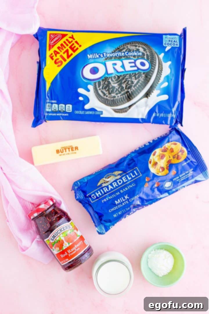 Decadent Raspberry Chocolate Tart 4 Ingredients for Easy Raspberry Chocolate Tart laid out on a white surface.