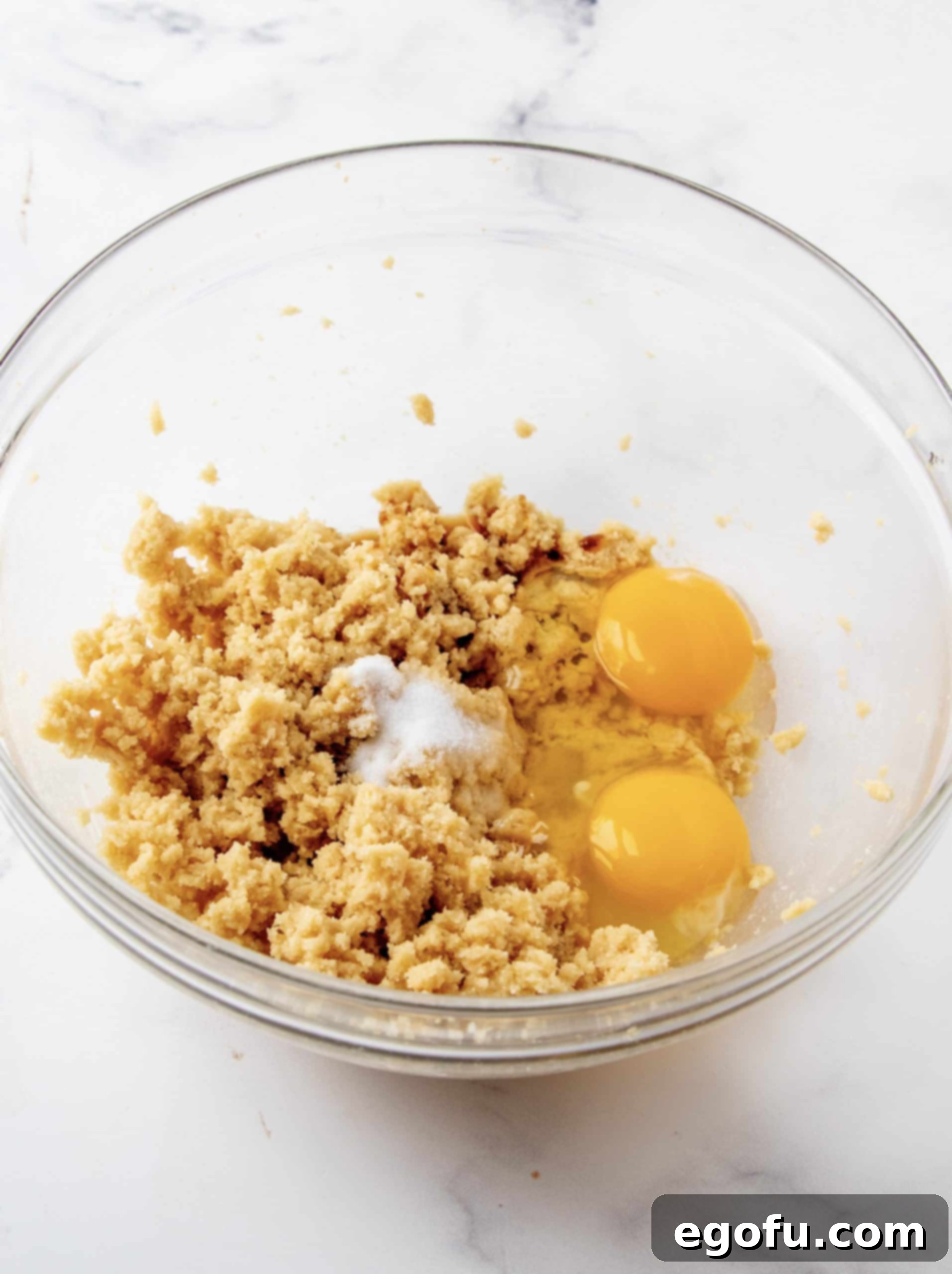 Eggs, vanilla and salt added to butter mixture.